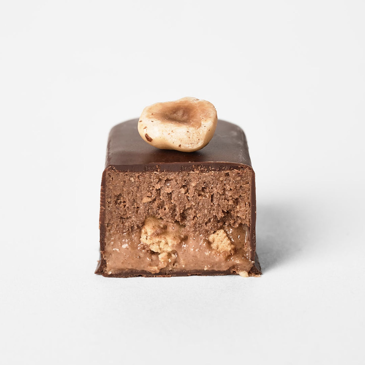 The bite - hazelnut praline - black